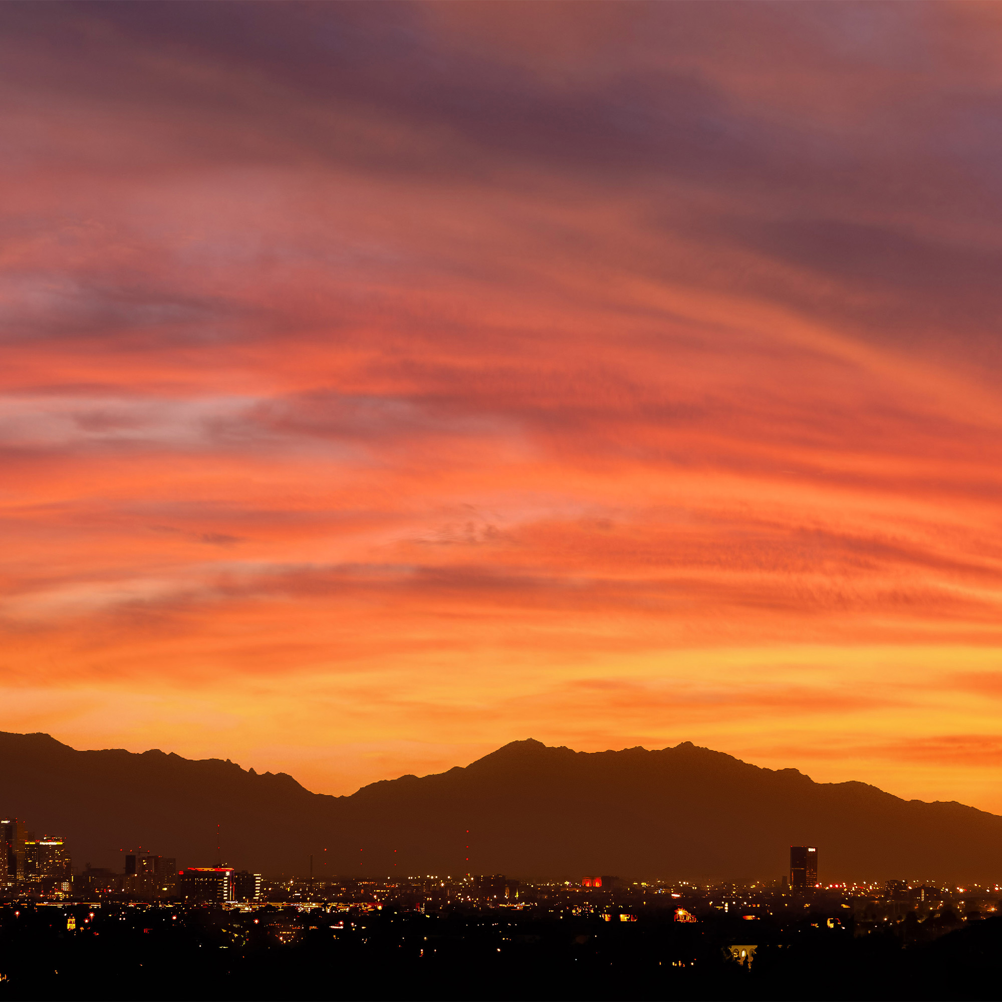 A skyline photo of Phoenix, Arizona at sunset